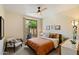 Relaxing bedroom with patio access, natural light, and warm tones for a cozy atmosphere at 6579 E Shooting Star Way, Scottsdale, AZ 85266