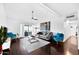 Bright living room features vaulted ceiling, ceiling fan and dark wood flooring at 7350 N Via Paseo Del Sur -- # O202, Scottsdale, AZ 85258