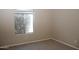 This carpeted bedroom has natural light from the window at 749 N 99Th St, Mesa, AZ 85207