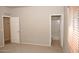 Neutral carpeted bedroom with connecting bathroom at 749 N 99Th St, Mesa, AZ 85207