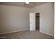 Carpeted bedroom with closet at 749 N 99Th St, Mesa, AZ 85207