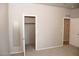 Carpeted bedroom with closet and connecting bathroom at 749 N 99Th St, Mesa, AZ 85207