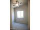 Small bedroom features natural light, neutral paint, and closet space at 749 N 99Th St, Mesa, AZ 85207