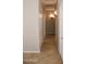 Neutral hallway features closet space, easy access to rooms, and modern lighting at 749 N 99Th St, Mesa, AZ 85207