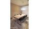 Dining room showcases a large table and contemporary black chairs at 7521 S 31St Pl, Phoenix, AZ 85042