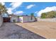 Spacious backyard with white shed and block fence, perfect for outdoor activities at 7614 W Cheery Lynn Rd, Phoenix, AZ 85033