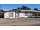 Charming single-story home featuring white brick, brick accents, and a low-maintenance desert landscape at 7614 W Cheery Lynn Rd, Phoenix, AZ 85033