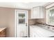 Laundry room with a washer and dryer, and a window for natural light and ventilation at 811 W Ocotillo Rd, Phoenix, AZ 85013