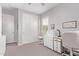 Bright bedroom featuring a ceiling fan, closet and carpet flooring at 9733 E Axle Ave, Mesa, AZ 85212