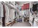 Spacious walk-in closet with shelving, rods, and organized storage solutions at 9733 E Axle Ave, Mesa, AZ 85212