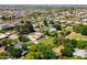 An aerial perspective captures a neighborhood, with a large backyard adding to the residential landscape at 10532 W Catalina Dr, Avondale, AZ 85392