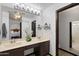 Bathroom features a double sink vanity, and closet at 10532 W Catalina Dr, Avondale, AZ 85392