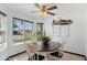 A breakfast nook area with tile floors and a ceiling fan at 10532 W Catalina Dr, Avondale, AZ 85392