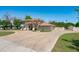 Long, circular driveway in front of a two-story home with mature landscaping at 10532 W Catalina Dr, Avondale, AZ 85392