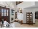 Entryway boasts tile floors, a dark wood door, and a decoratively styled bench at 10532 W Catalina Dr, Avondale, AZ 85392