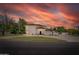 Stunning home with manicured lawn, mature trees, circular driveway, and fountain at 10532 W Catalina Dr, Avondale, AZ 85392