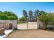 Gated entrance with secure fencing, ensuring privacy and access to the property at 10532 W Catalina Dr, Avondale, AZ 85392