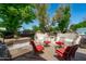Covered outdoor patio with a custom outdoor kitchen and a grill; perfect for al fresco dining at 10532 W Catalina Dr, Avondale, AZ 85392
