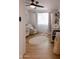 Bright Bedroom featuring a crib, rocking chair, natural light, and playful decor at 10609 N 32Nd Cir, Phoenix, AZ 85029