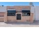 An outdoor kitchen and grill station in a backyard living area at 10609 N 32Nd Cir, Phoenix, AZ 85029