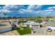 Aerial view of a home with solar panels, a well-manicured lawn, and a gray driveway at 11025 N 45Th Ln, Glendale, AZ 85304