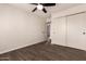 Bedroom features tile floors, closet, ceiling fan, and neutral walls offering space with comfort and functionality at 11025 N 45Th Ln, Glendale, AZ 85304