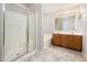 Bathroom with walk-in shower, soaking tub, and dual-sink vanity at 1144 E Elm Rd, San Tan Valley, AZ 85140