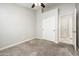 Bedroom with ceiling fan and closet at 1144 E Elm Rd, San Tan Valley, AZ 85140