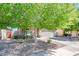 Lovely home exterior boasting a well-manicured lawn, mature trees, and a charming facade at 1144 E Elm Rd, San Tan Valley, AZ 85140