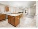 Modern kitchen with granite countertops, stainless steel appliances, and a functional center island at 1144 E Elm Rd, San Tan Valley, AZ 85140