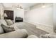 Comfortable living room with plush sofas, soft carpet, and a bright, airy feel at 1144 E Elm Rd, San Tan Valley, AZ 85140