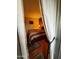 Bedroom featuring a queen-sized bed with striped bedding, partial obscured view at 12123 W Bell Rd # 337, Surprise, AZ 85378