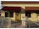 Inviting entrance with unique door and awning details, perfect for welcoming guests to your home at 12123 W Bell Rd # 337, Surprise, AZ 85378