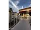 Exterior features include awnings, stucco, and walkway to front door at 12123 W Bell Rd # 337, Surprise, AZ 85378