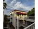 Exterior shot of the condo showcasing its appealing facade with balconies and nearby landscaping at 12123 W Bell Rd # 337, Surprise, AZ 85378