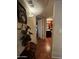 The hallway opens to a bathroom with a clean design and warm lighting at 12123 W Bell Rd # 337, Surprise, AZ 85378