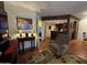 Cozy living room flowing into the kitchen, featuring tile floors and ample space for relaxation at 12123 W Bell Rd # 337, Surprise, AZ 85378