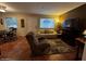 Inviting living area with a comfortable sofa, recliner, and plenty of natural light at 12123 W Bell Rd # 337, Surprise, AZ 85378