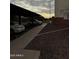 View of covered community parking area and landscaped grounds at 12123 W Bell Rd # 337, Surprise, AZ 85378