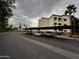 Community parking lot with covered spaces available to residents at 12123 W Bell Rd # 337, Surprise, AZ 85378