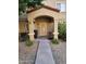 Inviting front porch with a secure door and lush greenery, offering a warm welcome at 125 S 56Th St # 75, Mesa, AZ 85206
