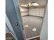 Garage features epoxy flooring, overhead storage and an automatic door opener at 125 S 56Th St # 75, Mesa, AZ 85206