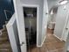 A view of the hallway closet offering additional storage solutions near the staircase at 125 S 56Th St # 75, Mesa, AZ 85206
