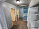 Upstairs hallway adjacent to a laundry closet at 125 S 56Th St # 75, Mesa, AZ 85206