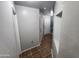 Hallway displaying neutral paint and tile floor leading to various rooms at 125 S 56Th St # 75, Mesa, AZ 85206