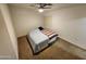 Cozy main bedroom featuring a ceiling fan and neutral-toned walls and carpet at 125 S 56Th St # 75, Mesa, AZ 85206
