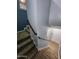 Carpeted staircase features wood handrails and leads to the front door at 125 S 56Th St # 75, Mesa, AZ 85206