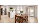 Cozy breakfast nook next to the kitchen, perfect for casual dining with backyard access at 14205 N 136Th Ln, Surprise, AZ 85379