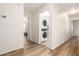 Hallway features a stackable washer and dryer at 14205 N 136Th Ln, Surprise, AZ 85379