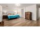 Spacious main bedroom with hardwood flooring, natural light, and a calm atmosphere at 14205 N 136Th Ln, Surprise, AZ 85379